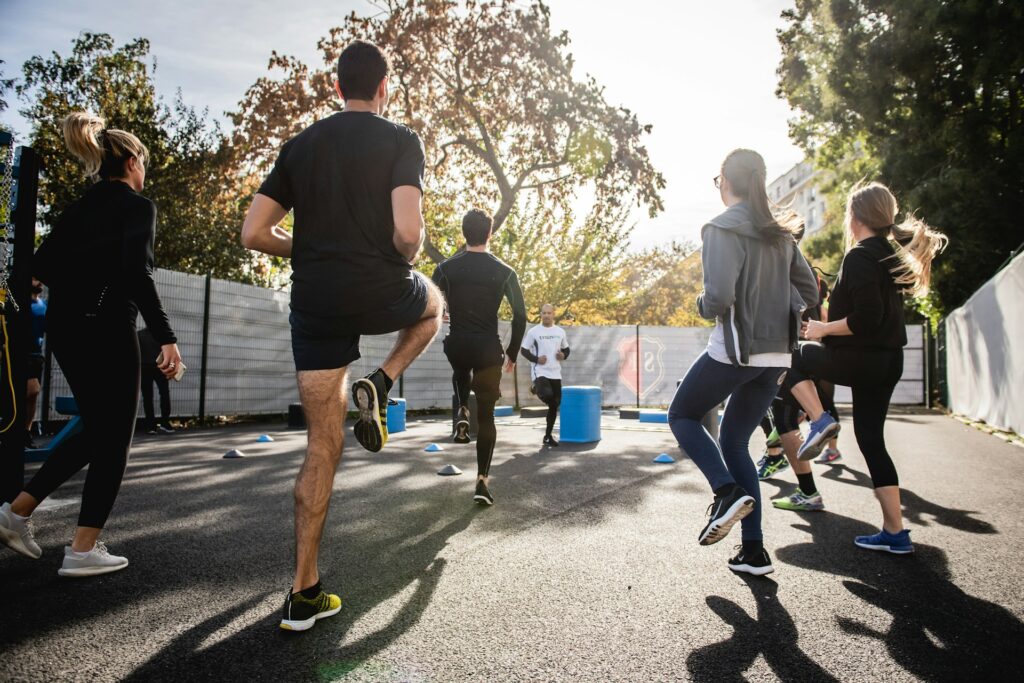 photo of people exercising, one of 5 Health Tips to Conquer Financial Stress